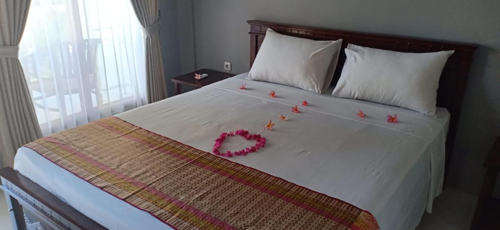 Rasti 2 Homestay Kuta  Стая снимка